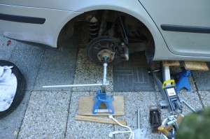 unscrew axis bolt